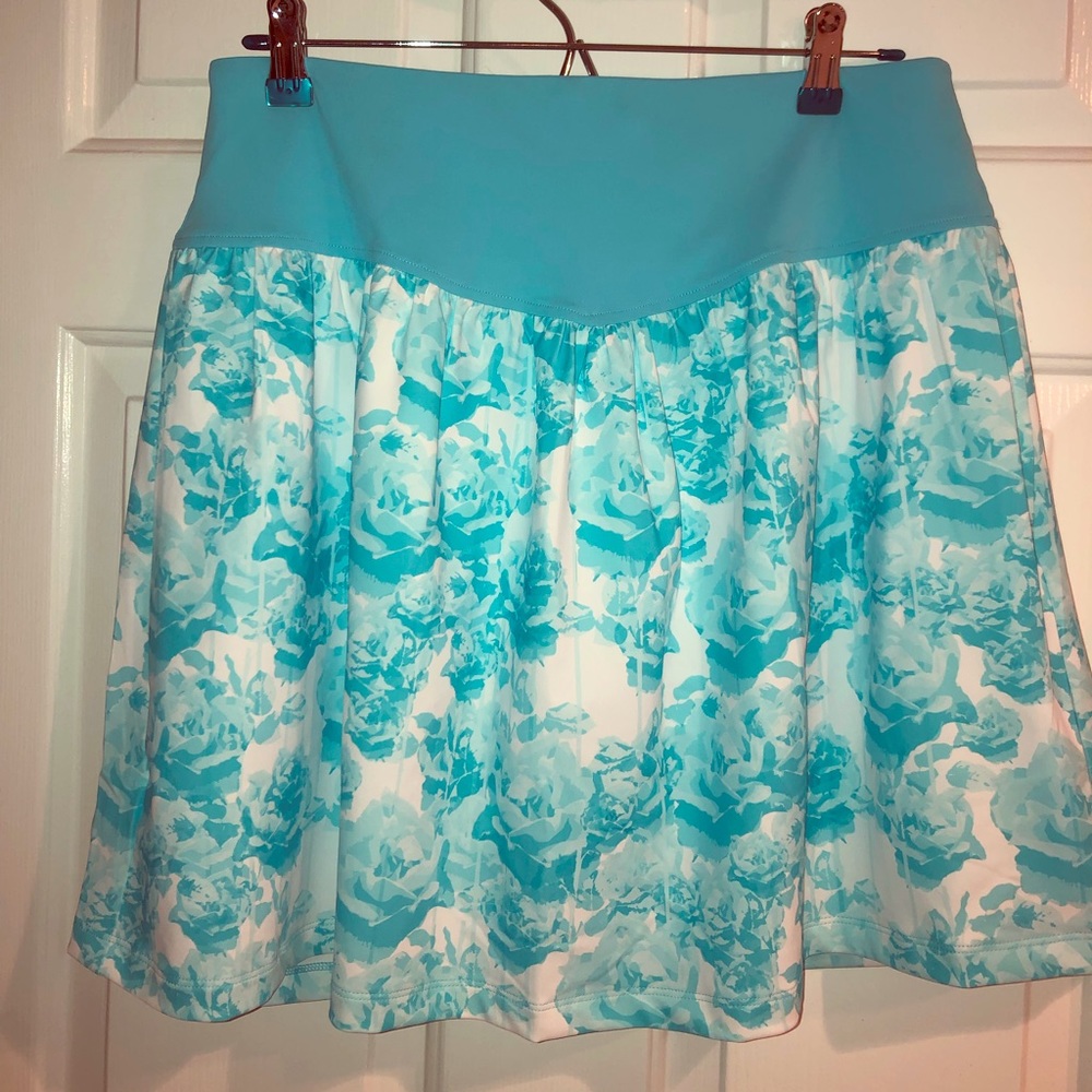 Aqua and white Annika golf skort.